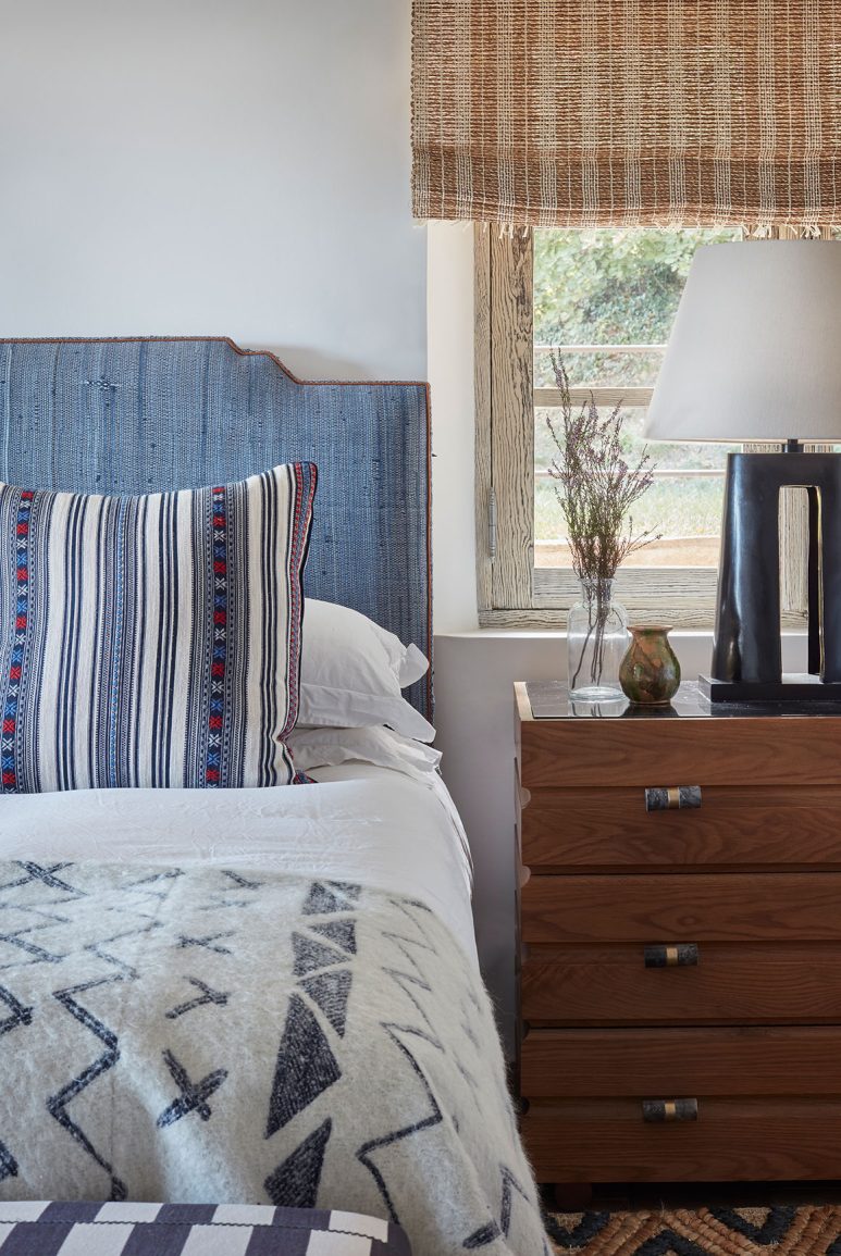 A beautiful guest bedroom of a renovated South of France villa with interiors by Studio Indigo