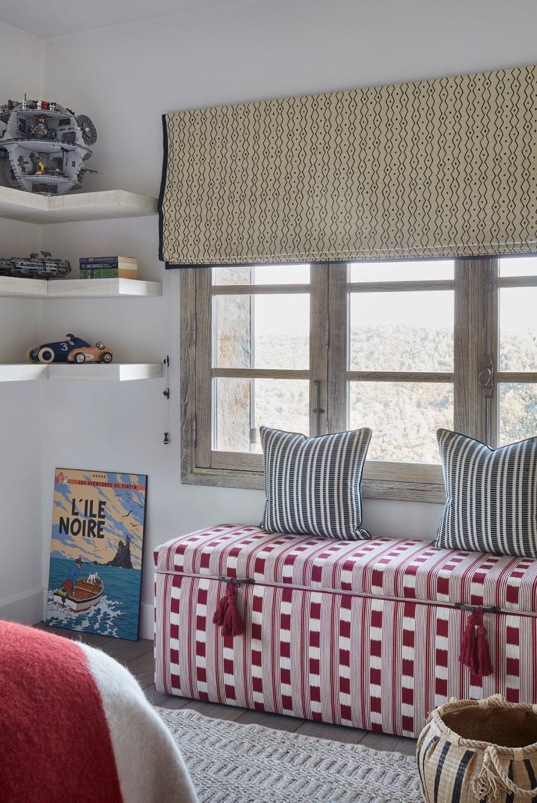 A beautiful guest bedroom of a renovated South of France villa with interiors by Studio Indigo