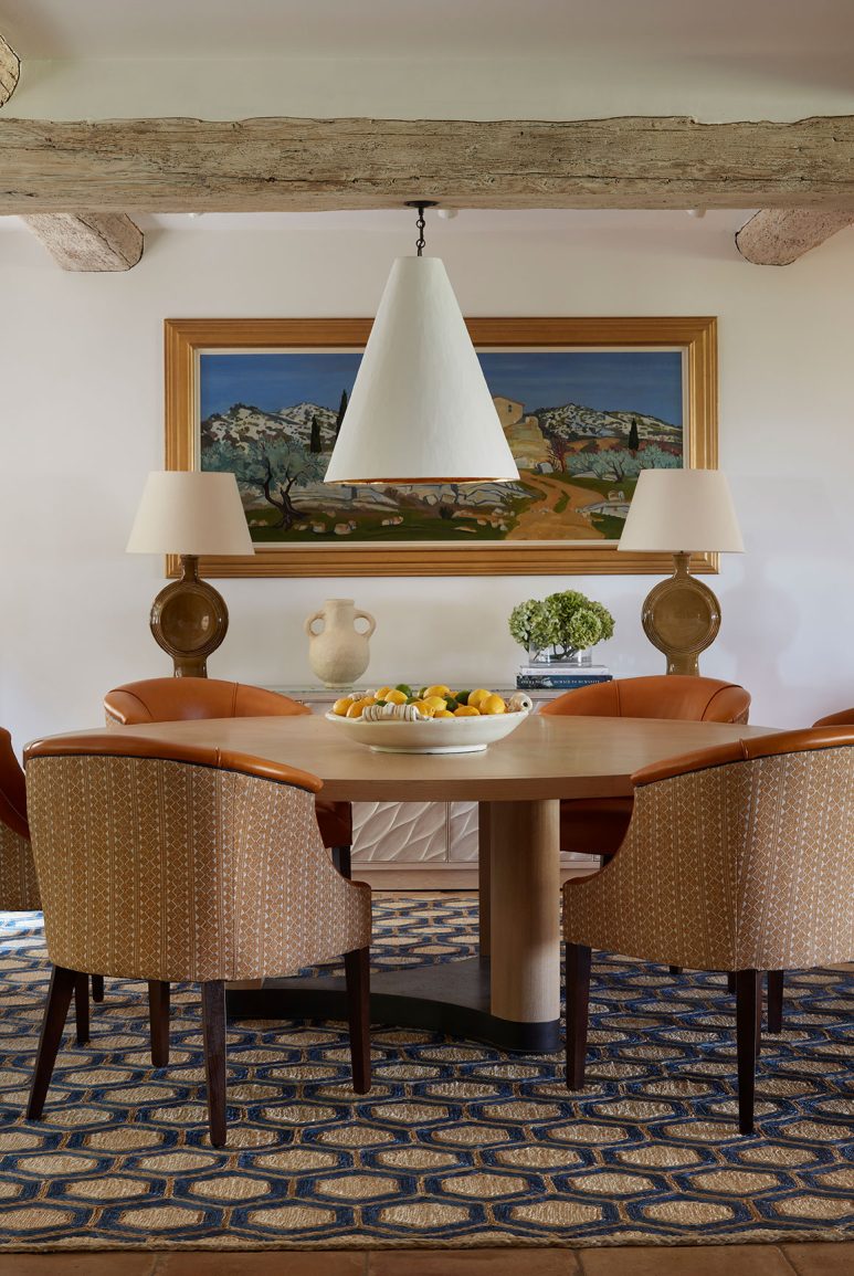 A beautiful dining space of a renovated South of France villa with interiors by Studio Indigo