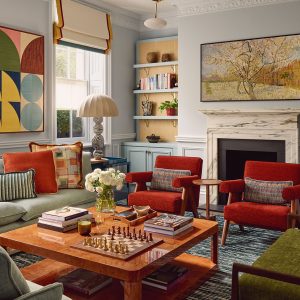 A bold, mid-century style family room designed by Studio Indigo